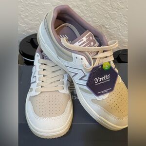 New Balance Women's Cream and White Sneakers